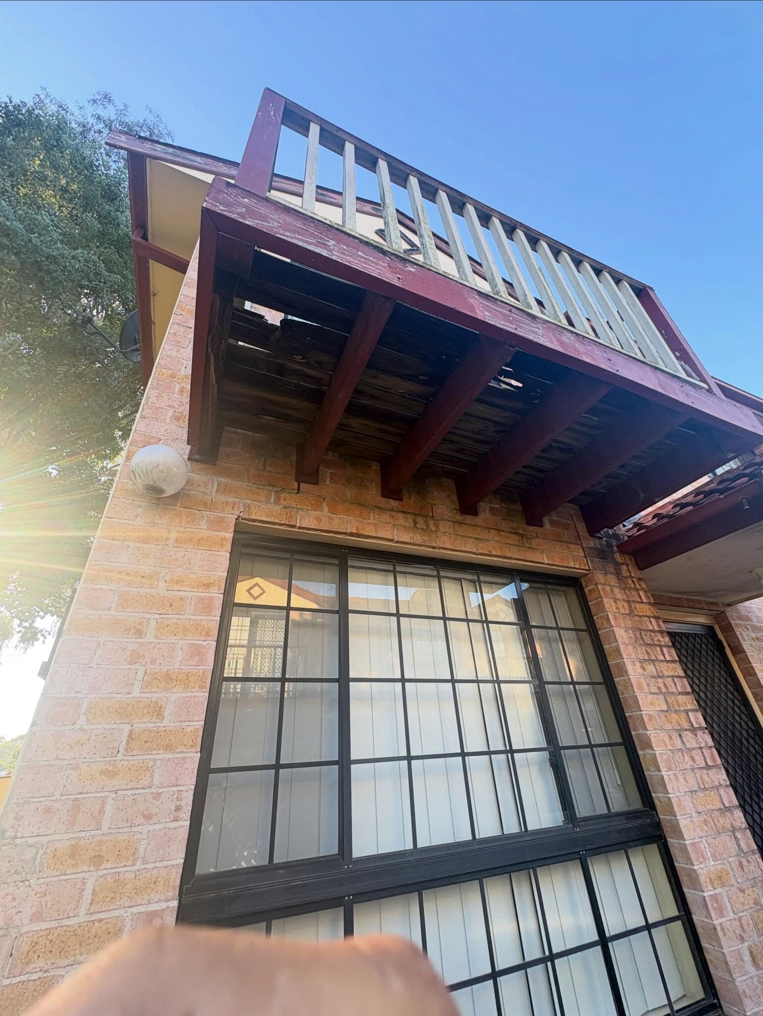 Balcony before — deteriorated underside structure